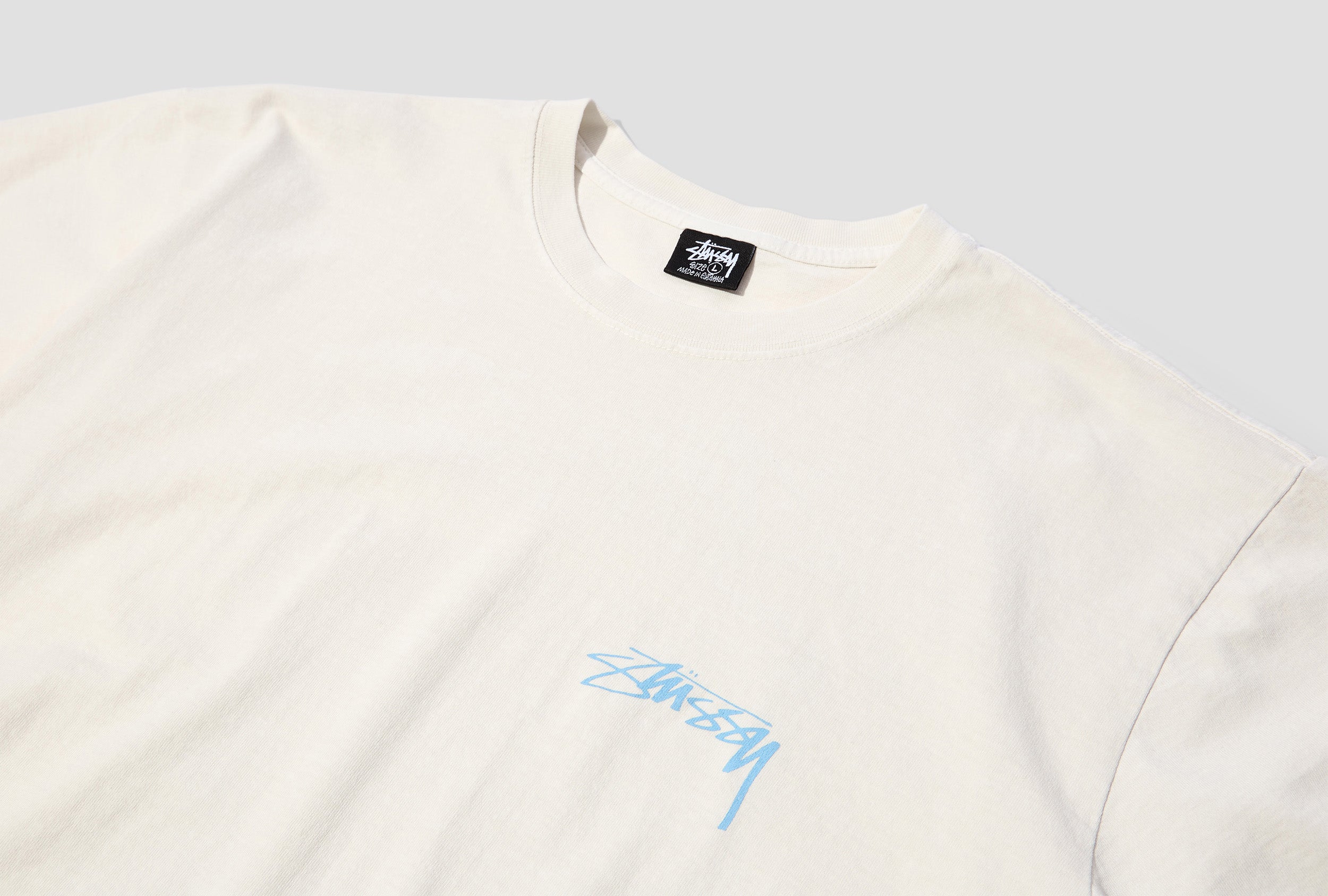 statue tee stussy
