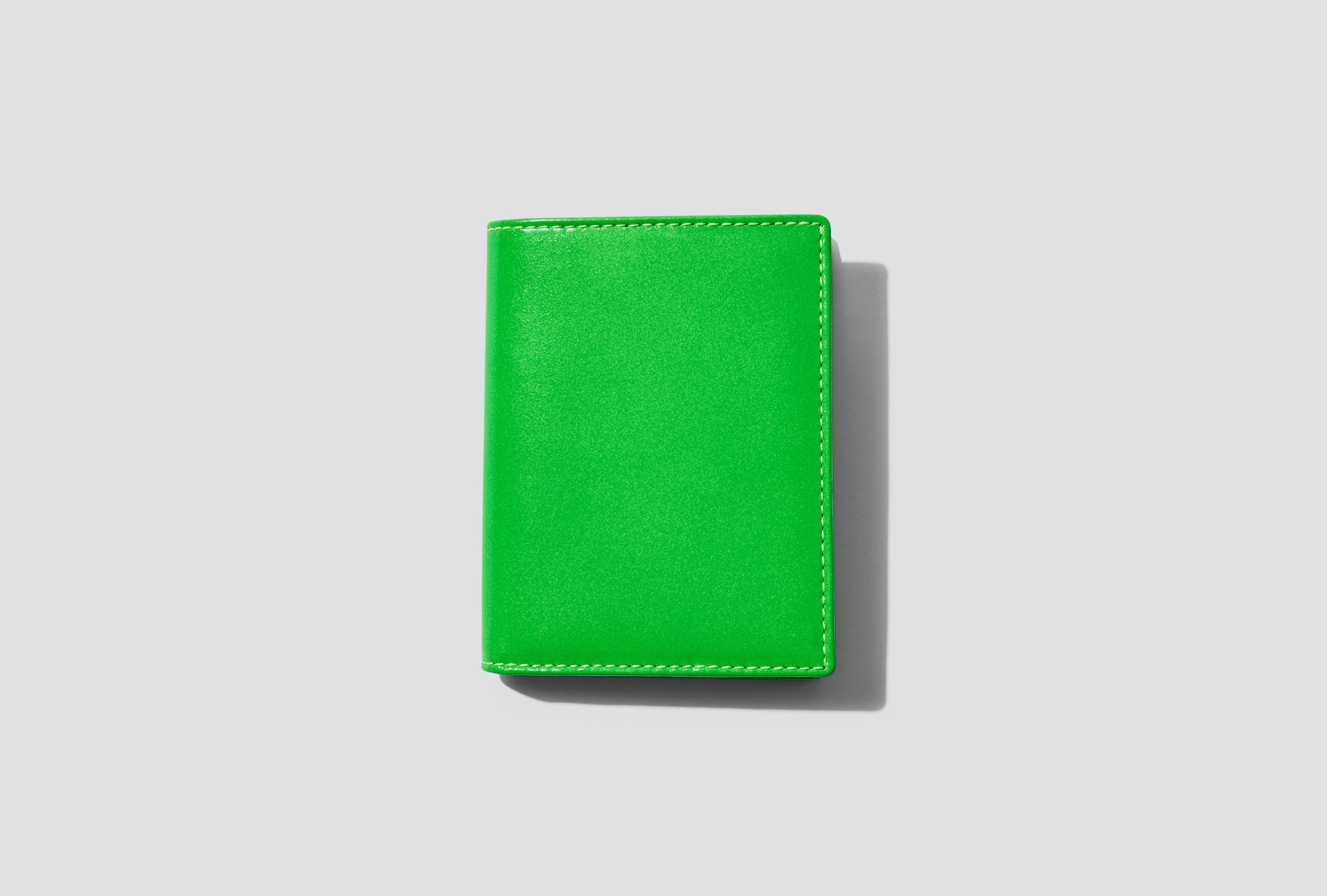 Comme des garcons wallet cheap neon