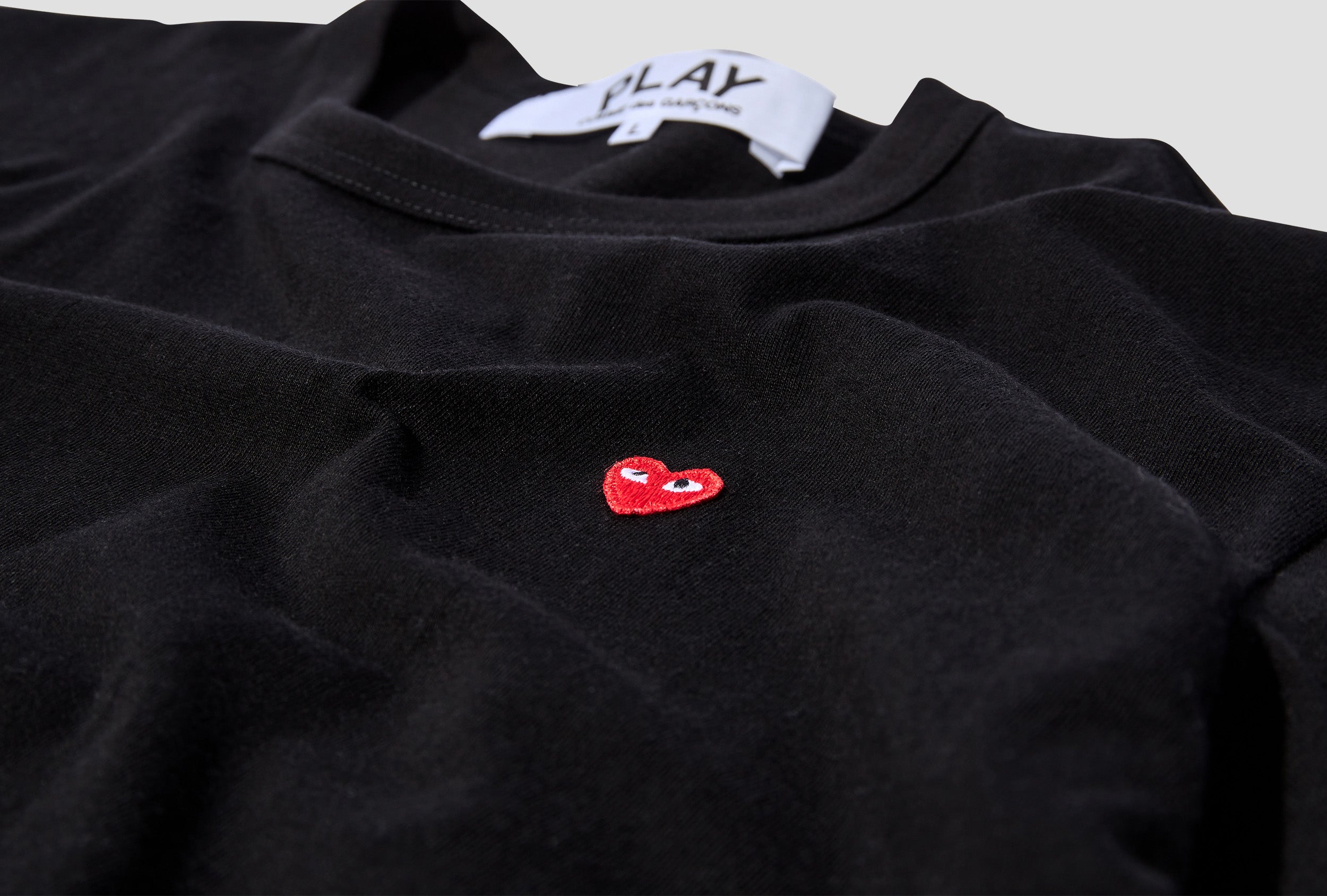 Comme des garcons black shirt with red outlet heart